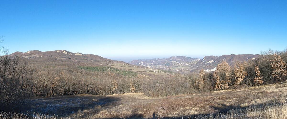 A mountainous landscape with a clear sky.