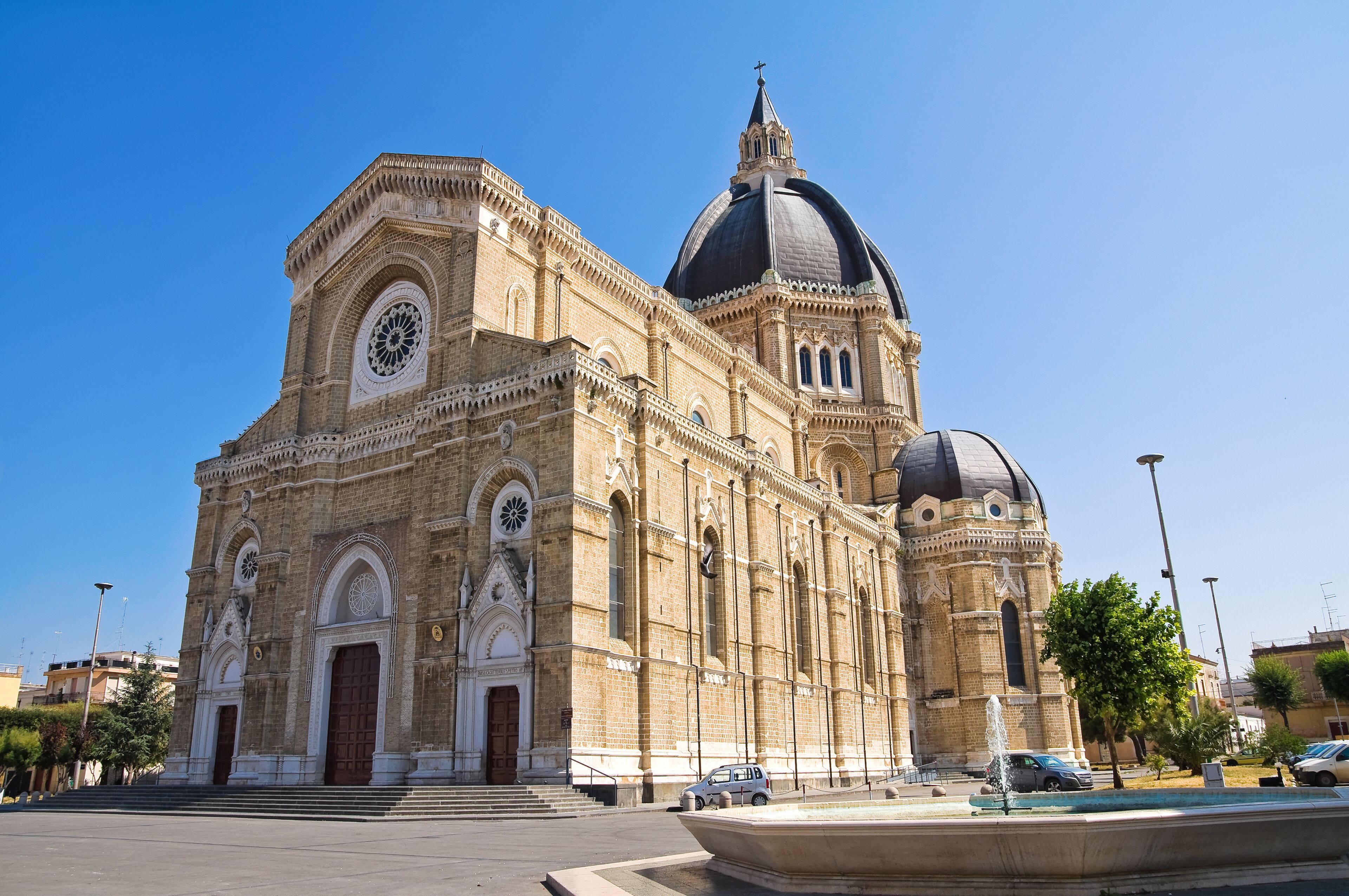 A historic church with a large dome and intricate facade.