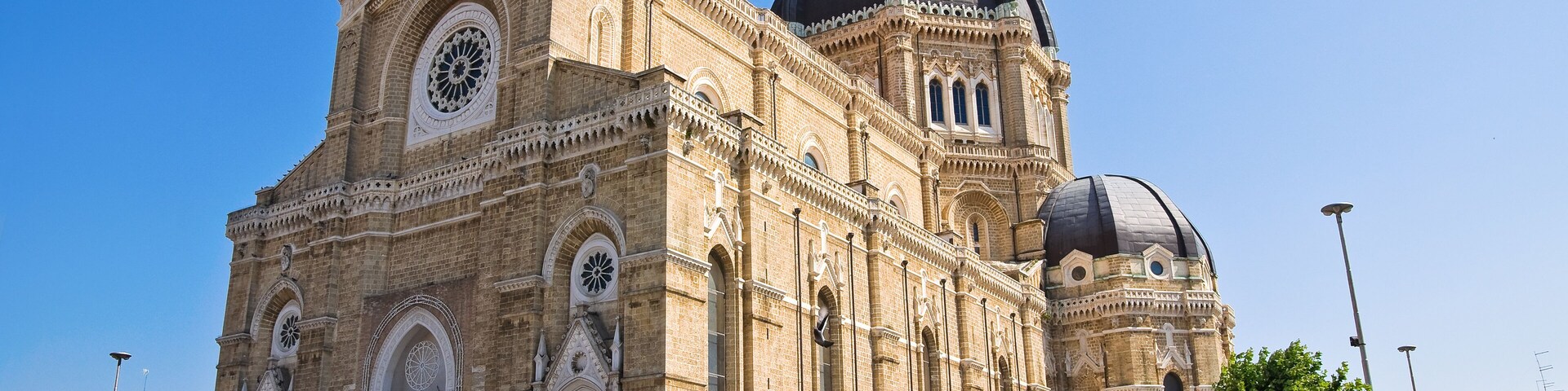 A historic church with a large dome and intricate facade.