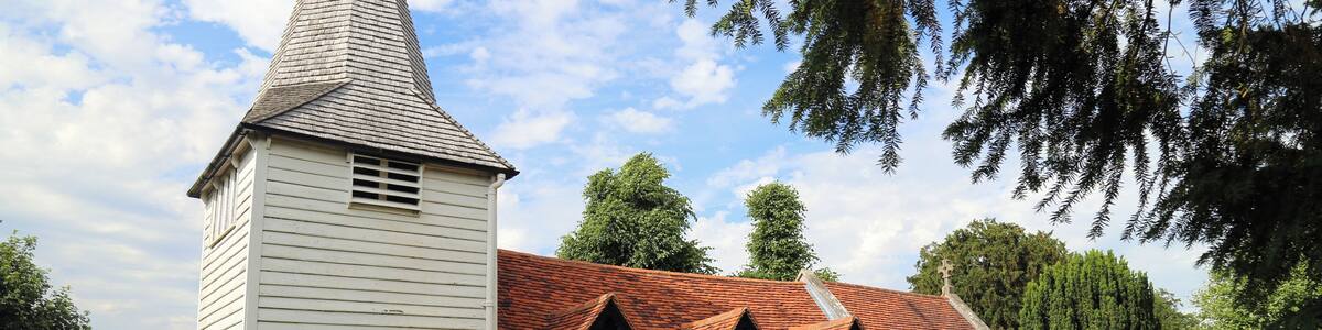 St Andrew's parish church, Greensted, in the civil parish of Ongar, Essex, England, seen from the churchyard footpath at the southwest