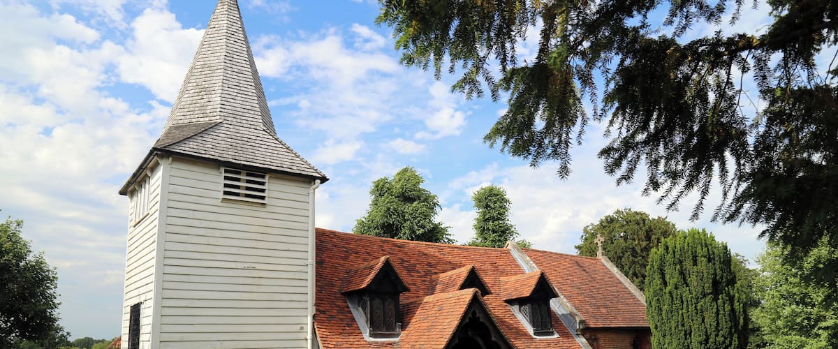 St Andrew's parish church, Greensted, in the civil parish of Ongar, Essex, England, seen from the churchyard footpath at the southwest