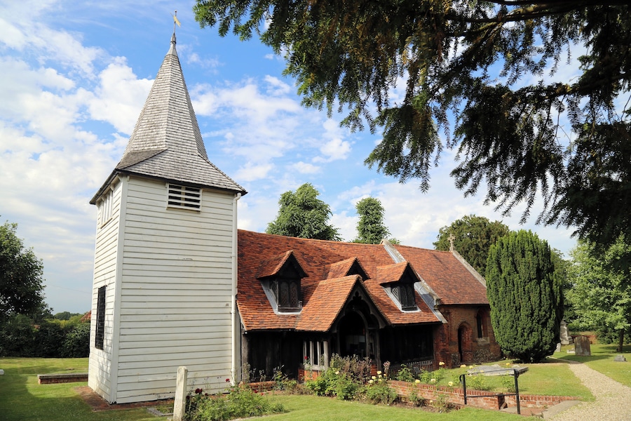 St Andrew's parish church, Greensted, in the civil parish of Ongar, Essex, England, seen from the churchyard footpath at the southwest
