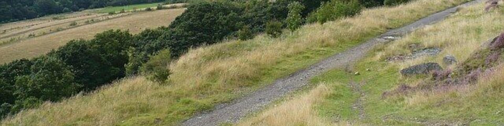 Upper Rhymney Valley. The view from 955781 showing the track from Abertysswg to Pontlottyn in the foreground. In the centre distance across the valley is Pontlottyn. On the right is Abertysswg.