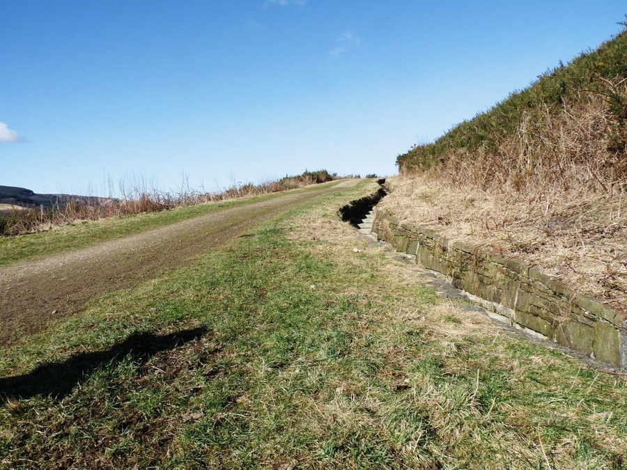 Water course Most land that has been reclaimed from mining activity has large areas of coal slag below. Lessons were learned for the Aberfan disaster and for this reason watercourses are built into the land to ensure water is drained from the land.
