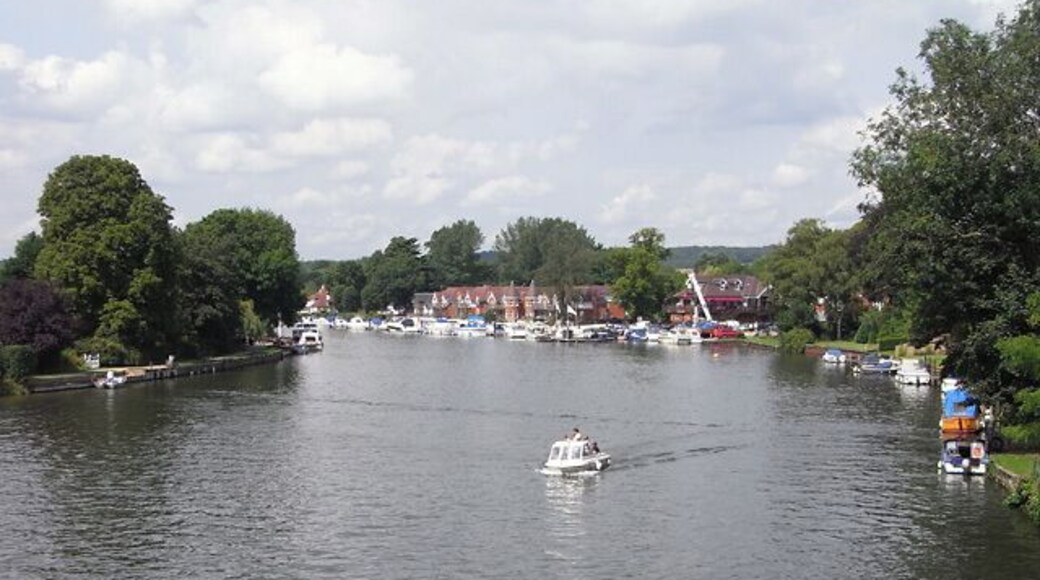 The River Thames, Bourne End The view upstream from the footbridge that accompanies the railway bridge. The footbridge carries a permissive footpath.