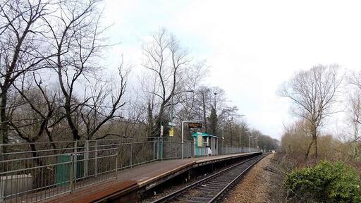Fernhill railway station. Viewed from a level crossing. Fernhill is a single-track, single-platform station on the Aberdare Branch of the Merthyr Line, between Mountain Ash station and Cwmbach station.