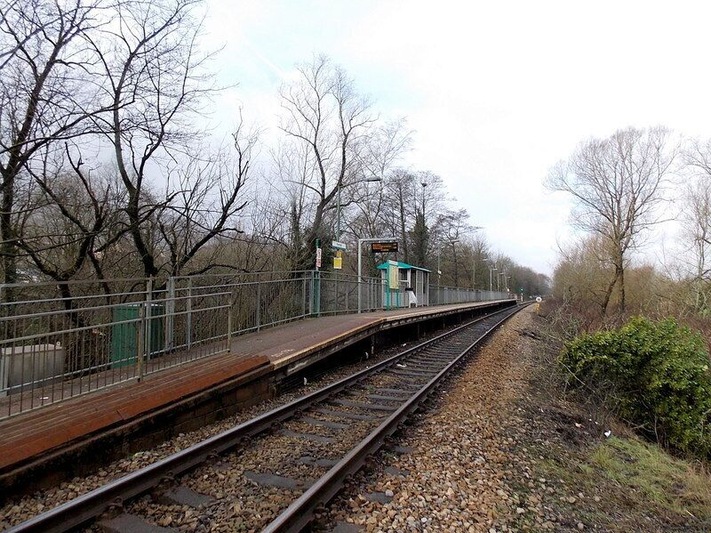 Fernhill railway station. Viewed from a level crossing. Fernhill is a single-track, single-platform station on the Aberdare Branch of the Merthyr Line, between Mountain Ash station and Cwmbach station.