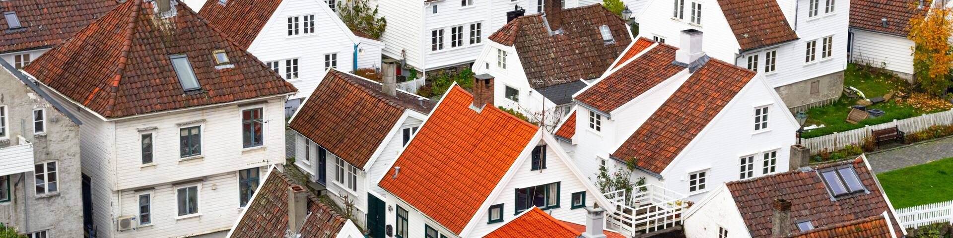 White houses and red rooftops, typical for the historic district Gamle Stavanger (Old Stavanger) in Stavanger, Norway