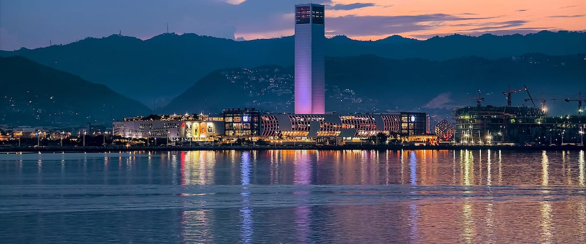Cebu City, Philippines - SM Seaside, and the under construction SM Arena and Convention Center at night, as seen from the sea.