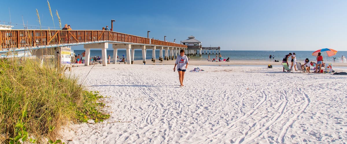 Fishing Pier Fort Myers Beach featuring general coastal views and a sandy beach as well as an individual femail