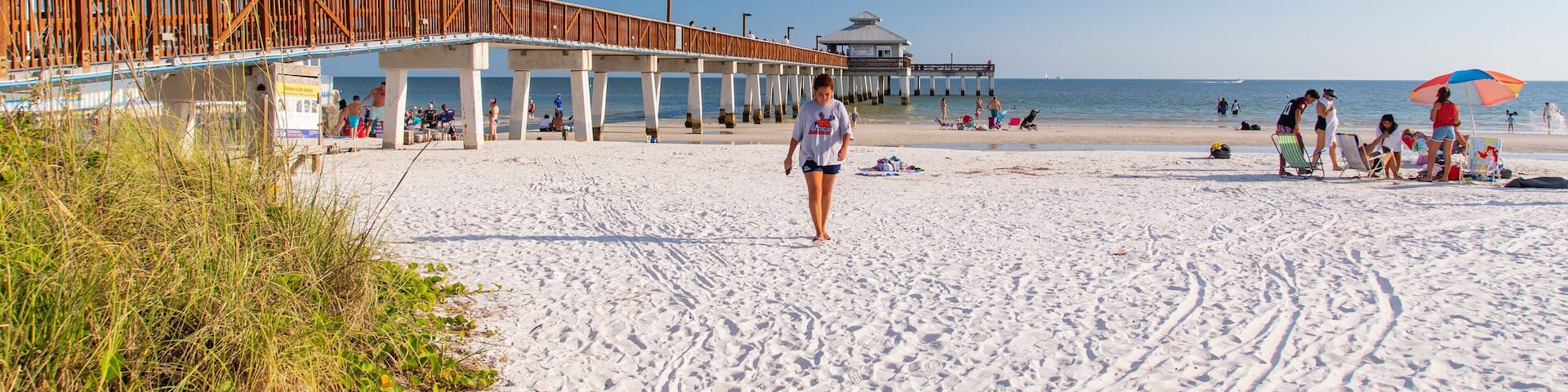 Fishing Pier Fort Myers Beach featuring general coastal views and a sandy beach as well as an individual femail
