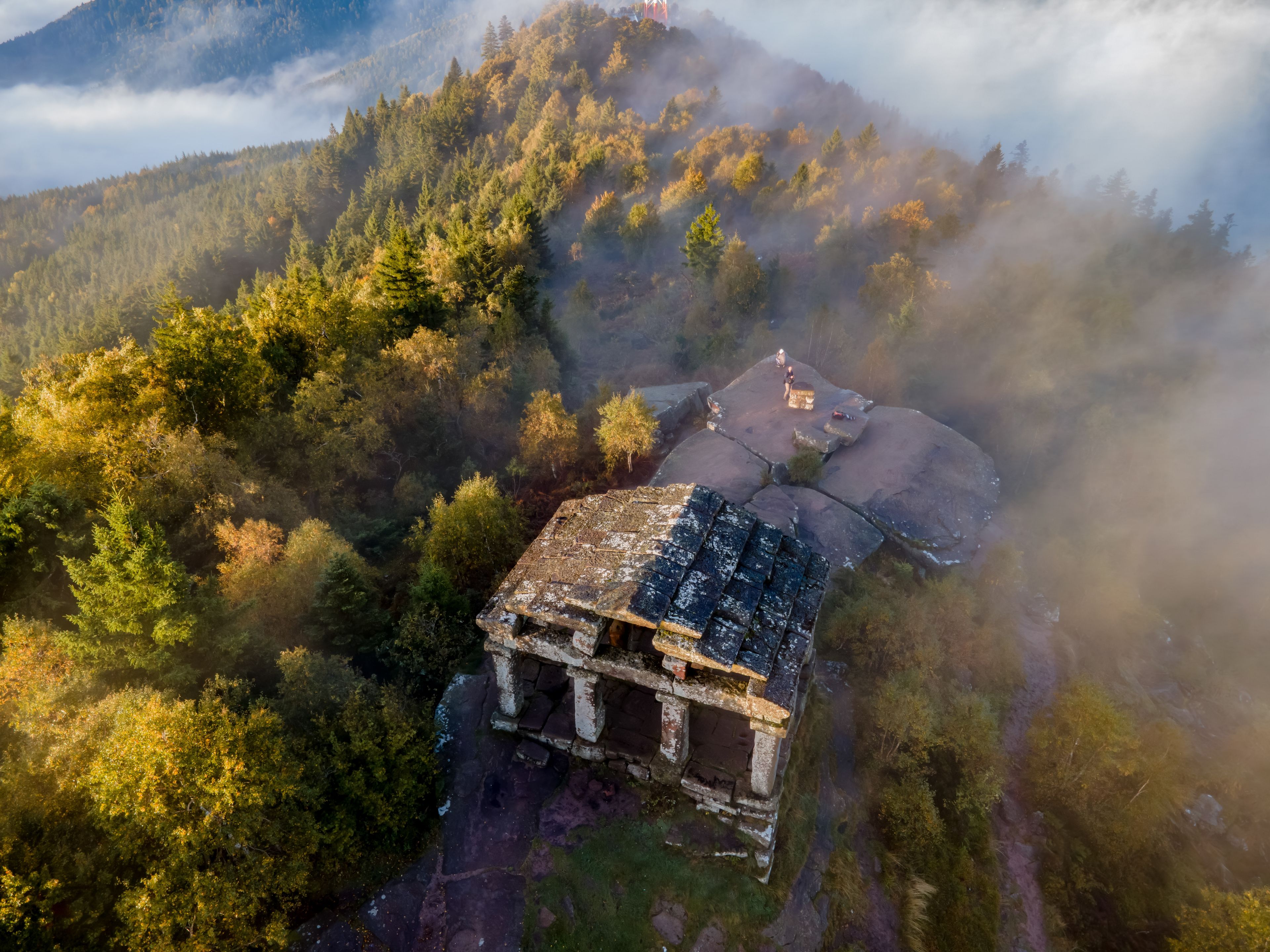 FRANCE. ALSACE. BAS-RHIN 67 GRANDFONTAINE. PERCHED ATOP THE DONON MASSIF, THE TEMPLE WATCHES OVER THE VOSGES RIDGES, AN ENIGMATIC SILHOUETTE EMERGING FROM A LANDSCAPE STEEPED IN HISTORY.