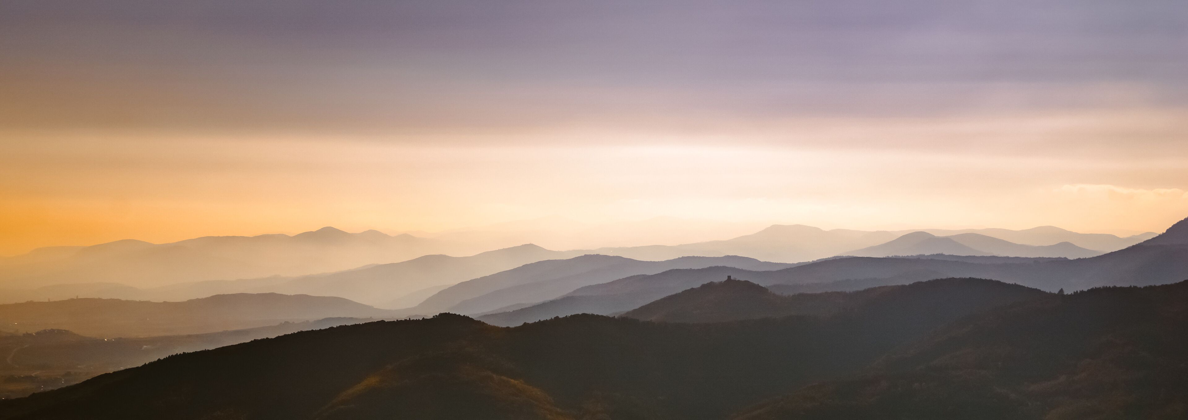 A mountain range with a misty atmosphere.