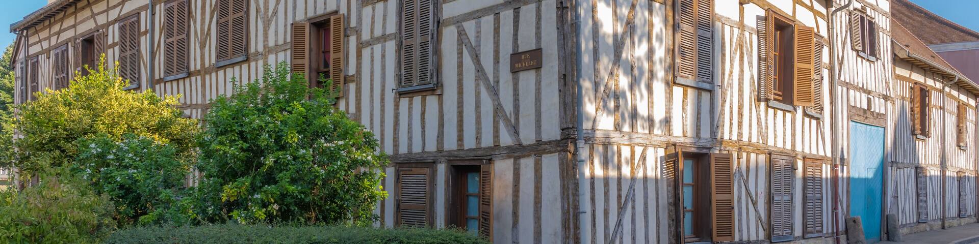 Troyes, France - 09 08 2019: Typical street with half-timbered facades