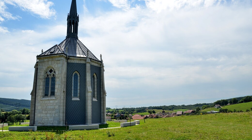 The chapel Notre Dame des Anges at Ouhans (the village can be seen in the background) Jura