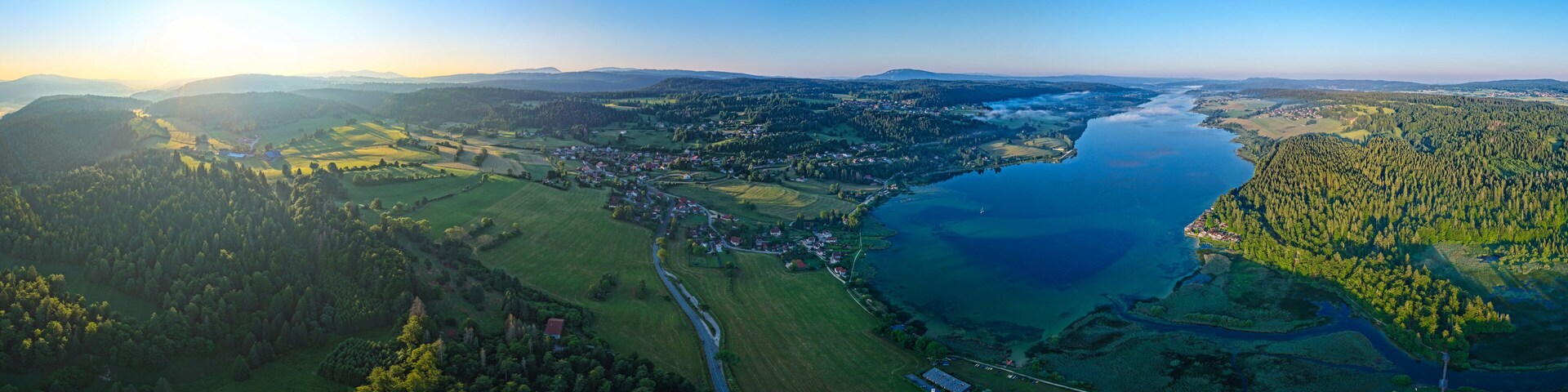 Aerial view of Lac de Vouglans in the Jura, France at sunrise