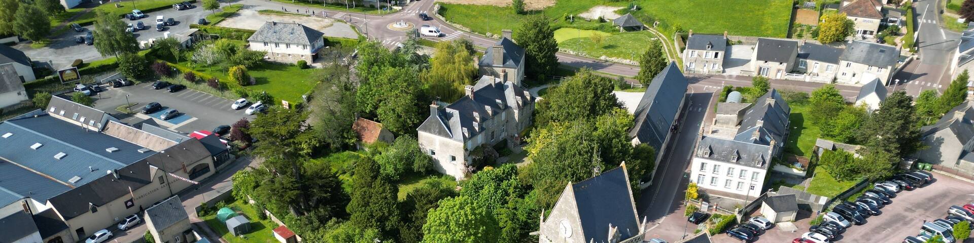 Sainte Mere Eglise Normandy France Overhead birds eye drone aerial view of church