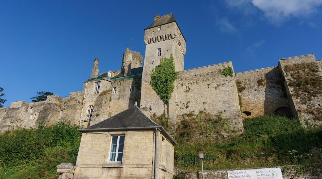 Chateau de Creully castle on a sunny summer evening with blue sky, Creully sur Seulles, Normandy, France