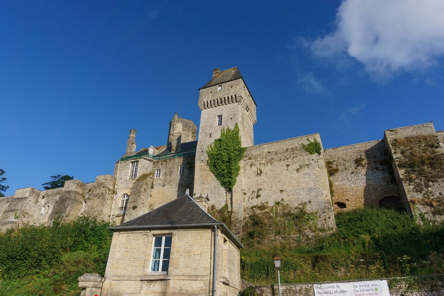 Chateau de Creully castle on a sunny summer evening with blue sky, Creully sur Seulles, Normandy, France