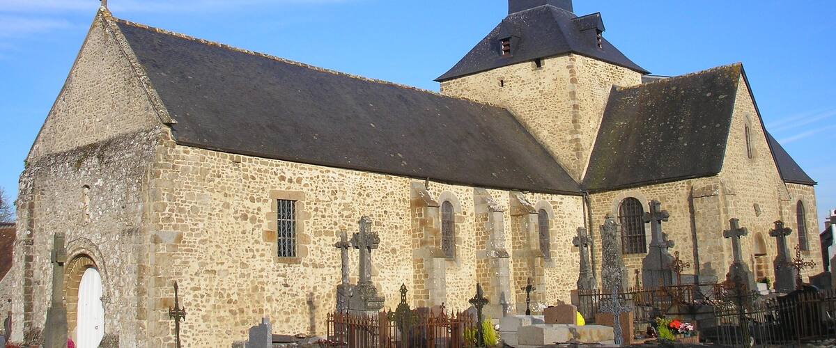 A church with a tall spire and a stone facade.