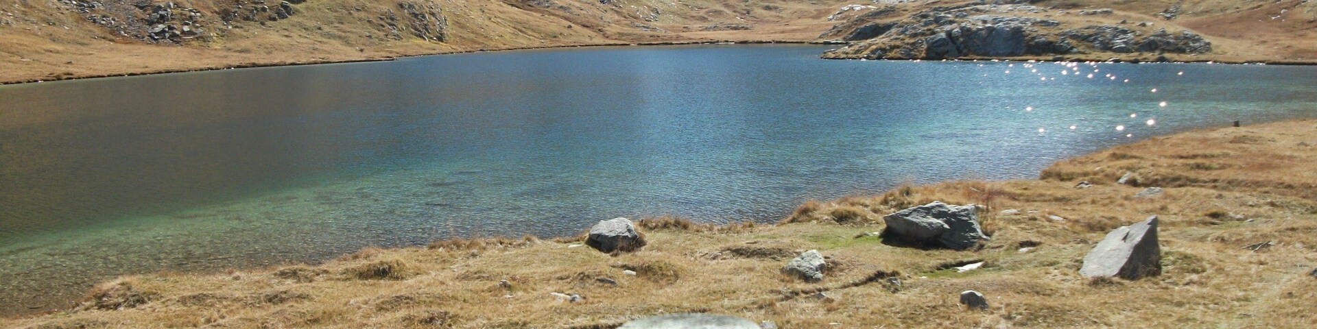 Lake Lauzanier (2,284 m) with sign