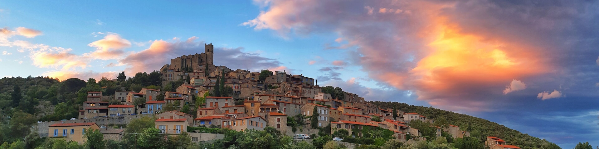 One of France most beautiful villages at sunset. Eus is a picturesque village built into the hills in the pyrenees area of southern France. #village #eus #france #beautiful #roadtrip