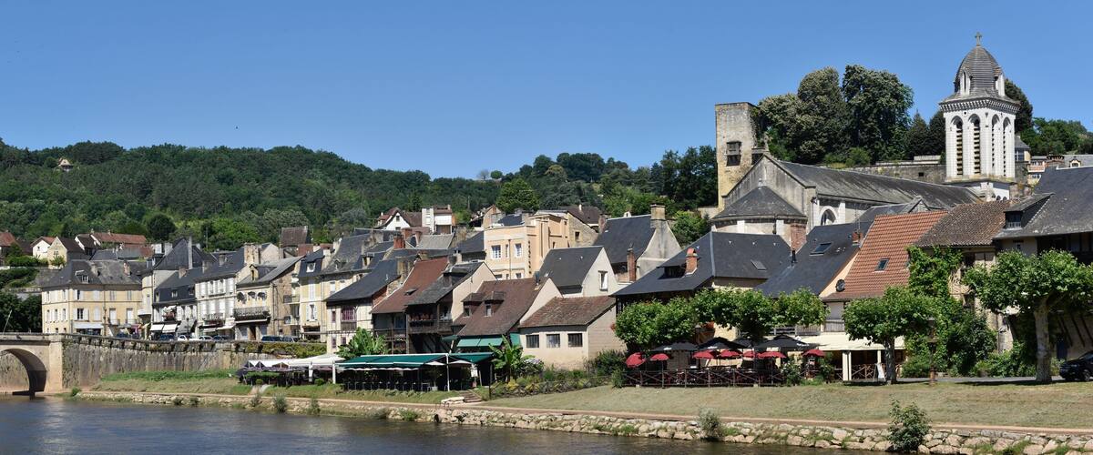 View at the medieval village of Montignac, at the foreground the Vezere river.