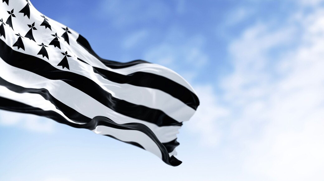 Brittany flag waving with french national flag on a clear day