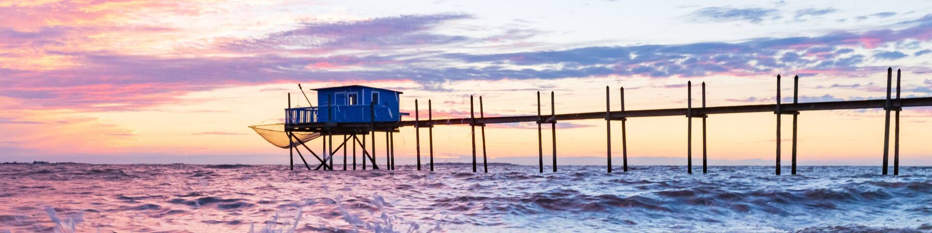 Huts of fishermen in the sunset