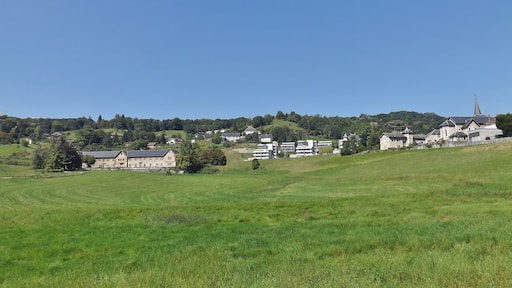 General sight on the French commune of Bassens, near Chambéry in Savoie. Can be seen, on the left, the ferme de Bressieux farm, and on the right, the church and town hall.
