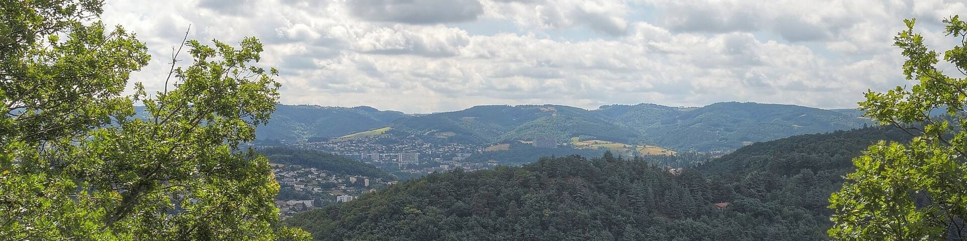View of the Pertuiset Bridge from Les Ăchanges, with the l'UnitĂ© d'Habitation from Le Corbusier in Firminy in the background.
