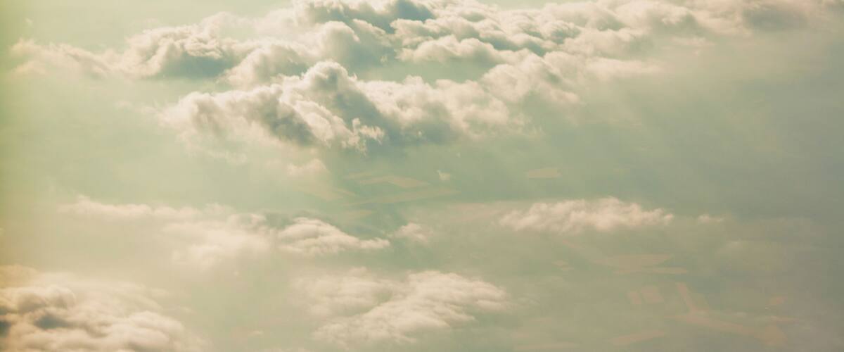 A view of fluffy clouds in the sky.