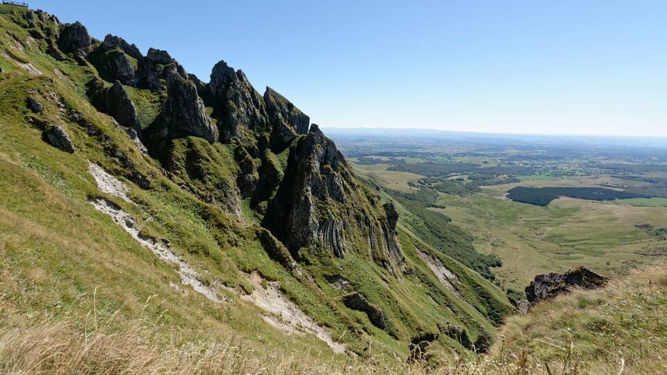 A mountainous landscape with a clear sky.