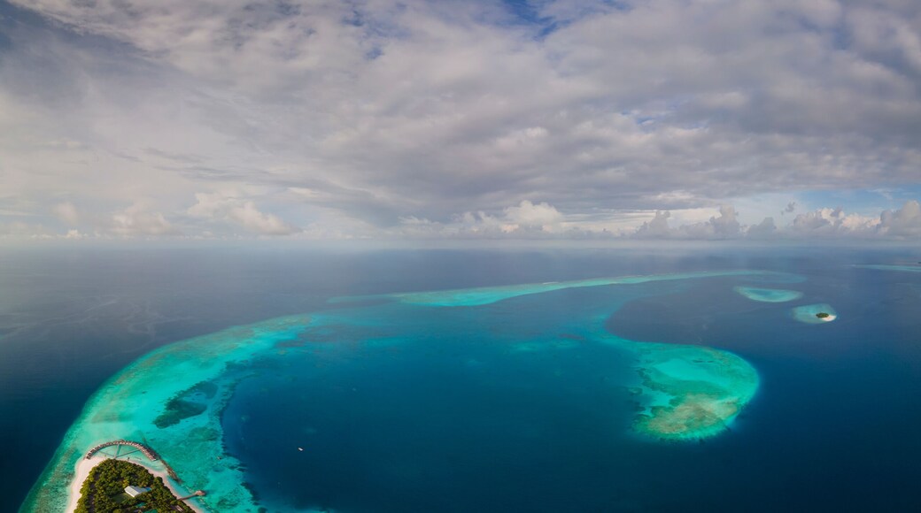 Panoramic aerial view of tropical island in the morning, Baa Atoll, Maldives.
