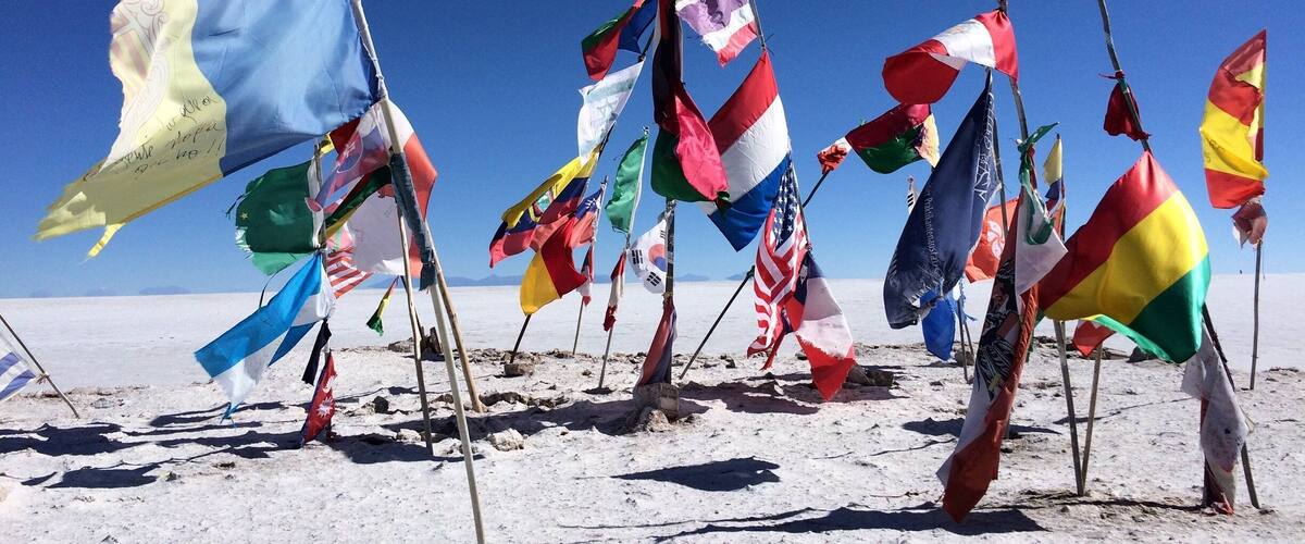 Caption---- Flags at Uyuni Salt Flats