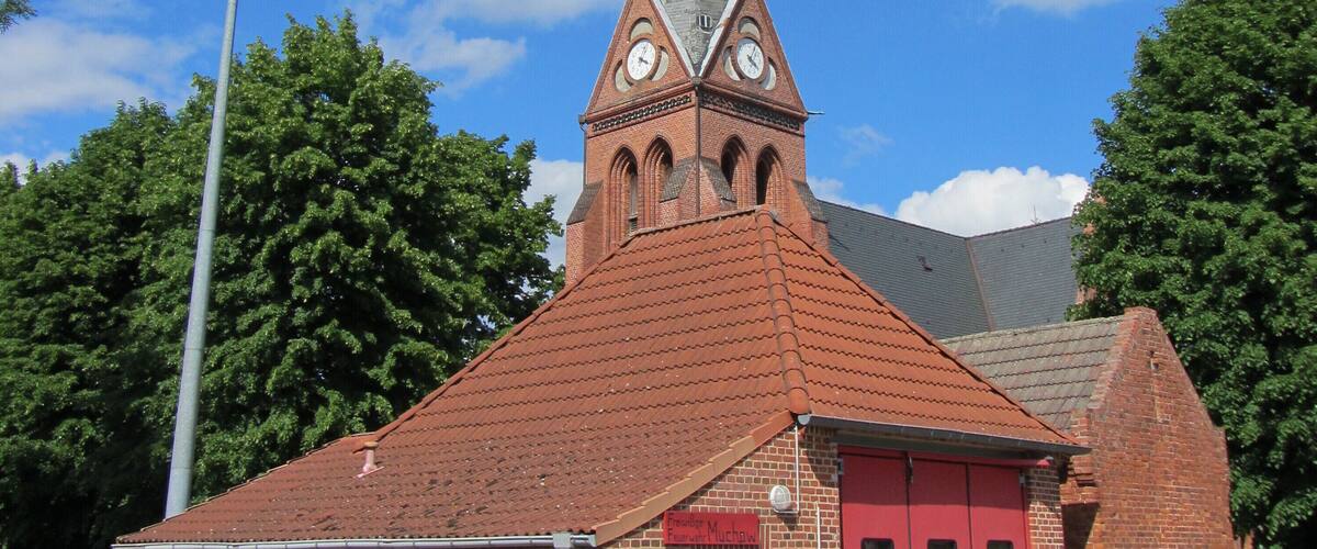 Fire station and church in Muchow, district Ludwigslust-Parchim, Mecklenburg-Vorpommern, Germany