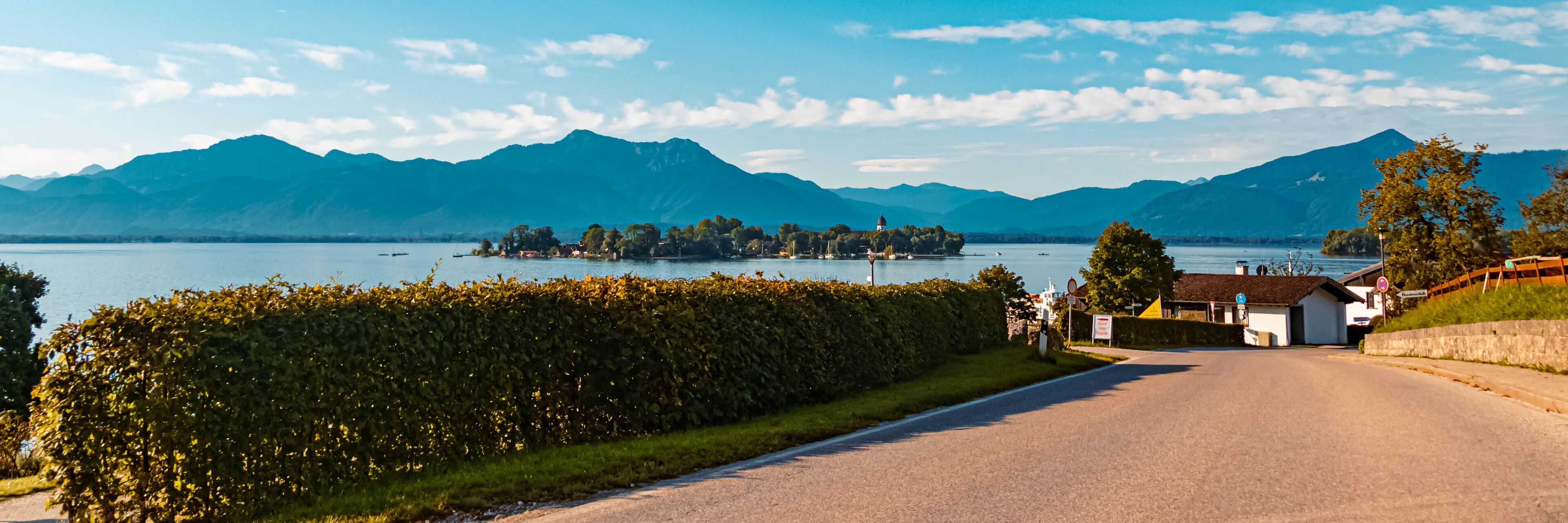 Beautiful alpine summer view with the famous Fraueninsel at Gstadt, Chiemsee, Bavaria, Germany