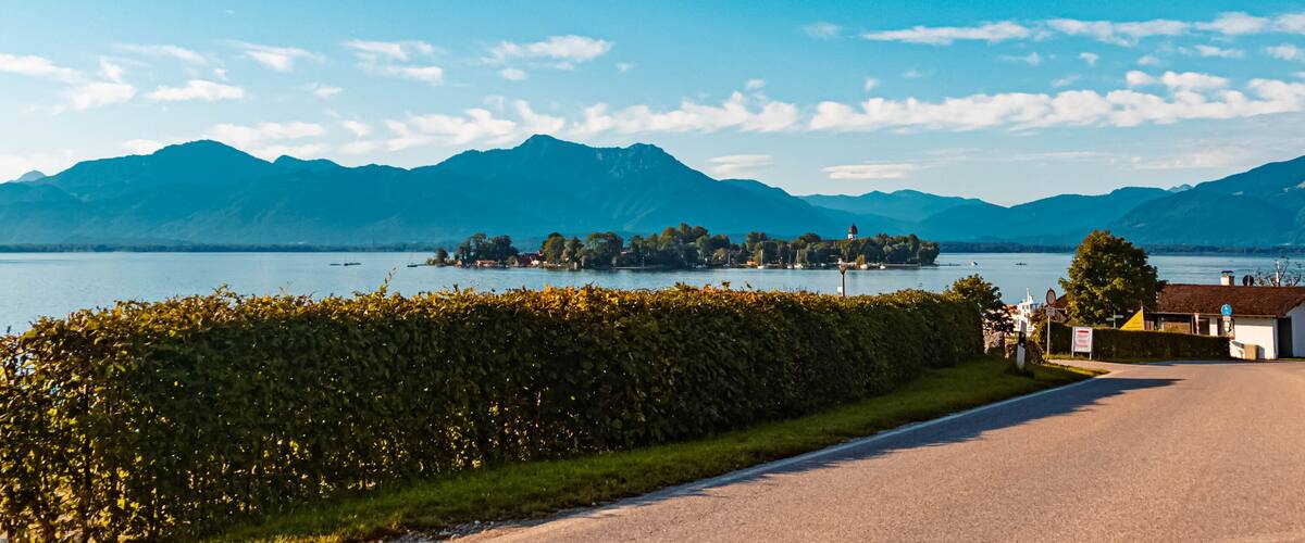Beautiful alpine summer view with the famous Fraueninsel at Gstadt, Chiemsee, Bavaria, Germany