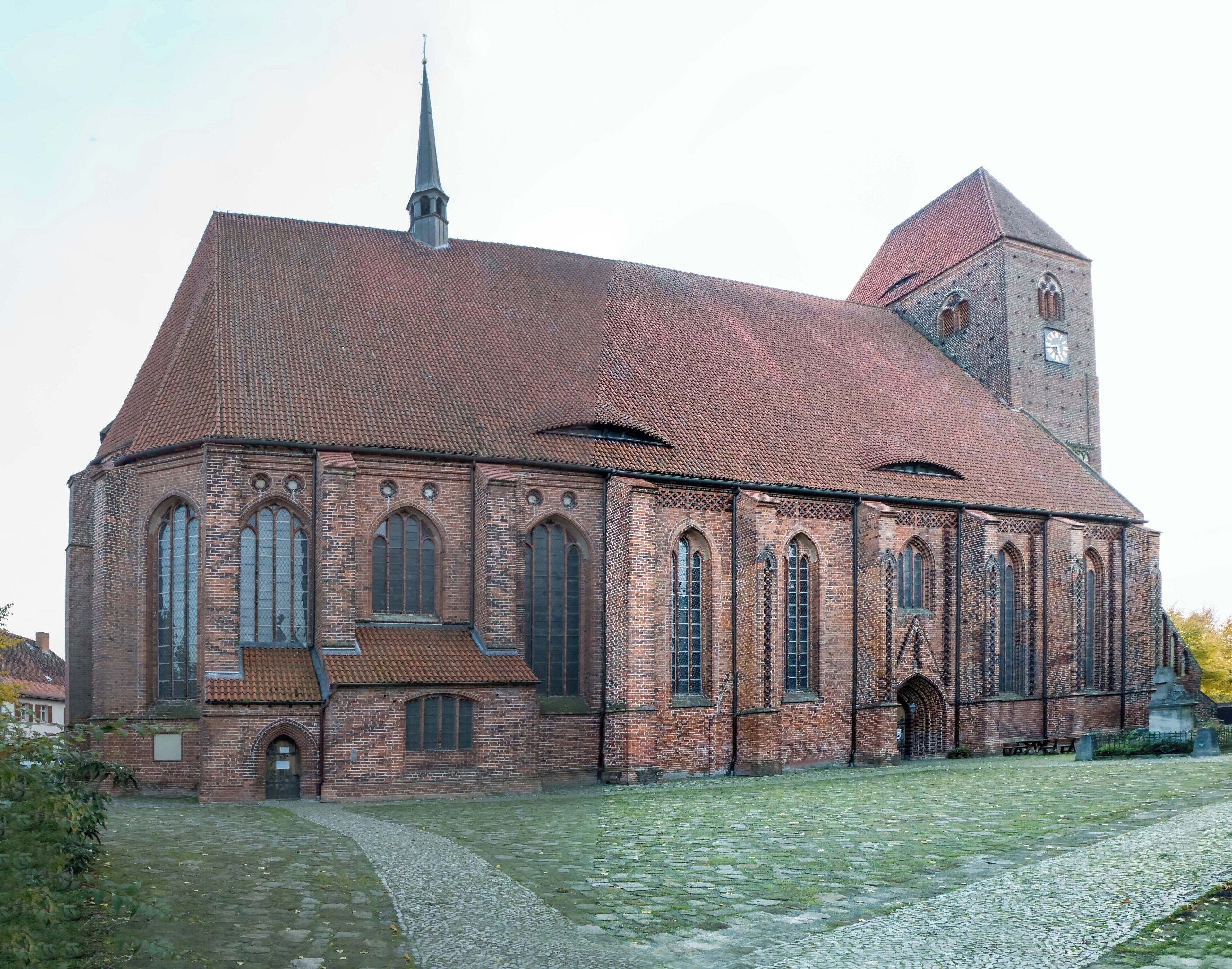 A historic church with a tall steeple and a clock tower.
