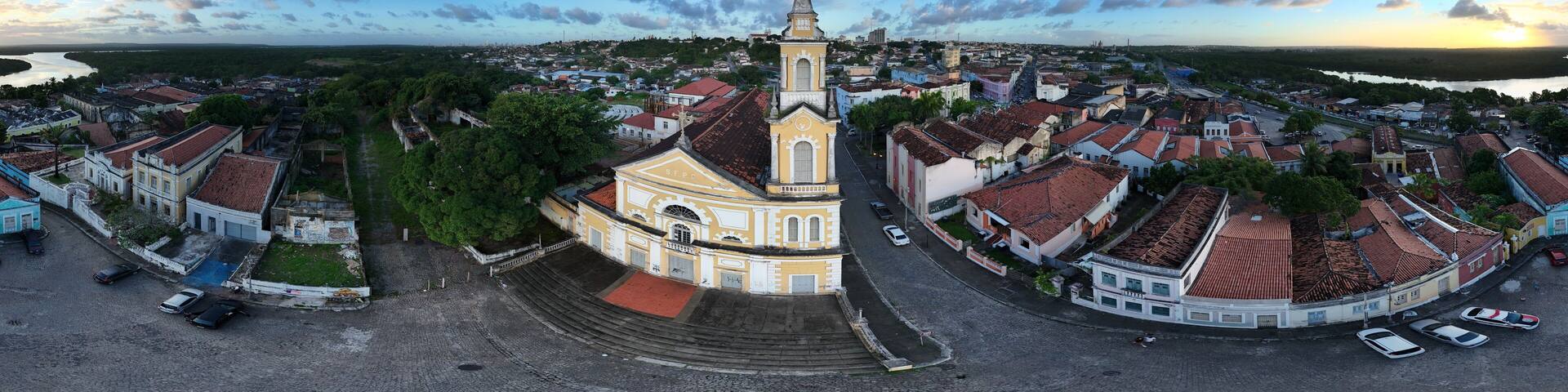 360 aerial photo taken with drone of Church of São Frei Pedro Gonçalves in João Pessoa, Brazil at sunset