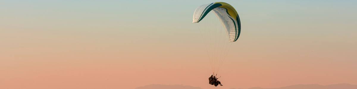 Pico do Gavião, Andradas, Minas Gerais, Brazil: sunset at the top of mantiqueira mountain with paraglaider flight