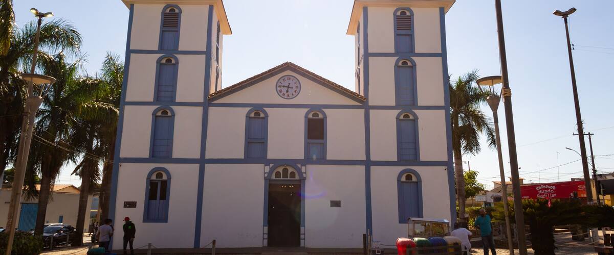 A church with two towers and a clock.
