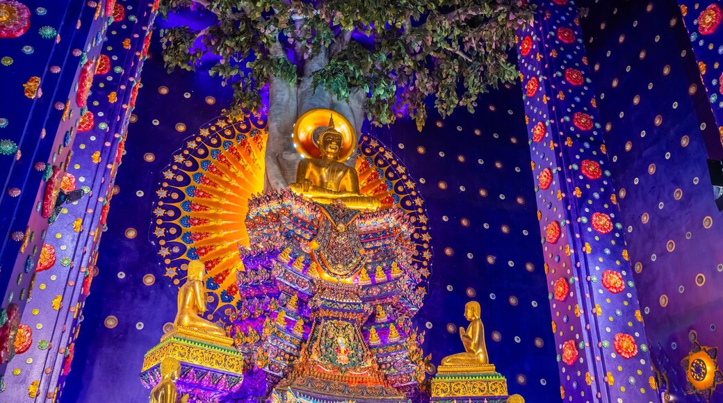 Wat Klang Khlong Watthanaram, or Wat Muang, in Sena, Ayutthaya, is famed for its vibrant purple ordination hall and intricate decorations, making it a notable landmark in the area.