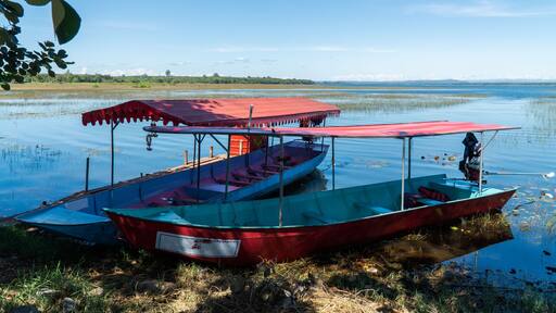 boats serving tourists.The water,the swamp,fog,the mountain,the beautiful sky and cloud at Bueng Khong Long,Seka district,Bung Kan province,Thailand.