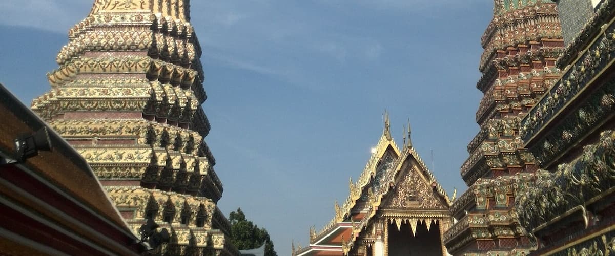 Ornate temple spires with intricate designs against a clear sky.