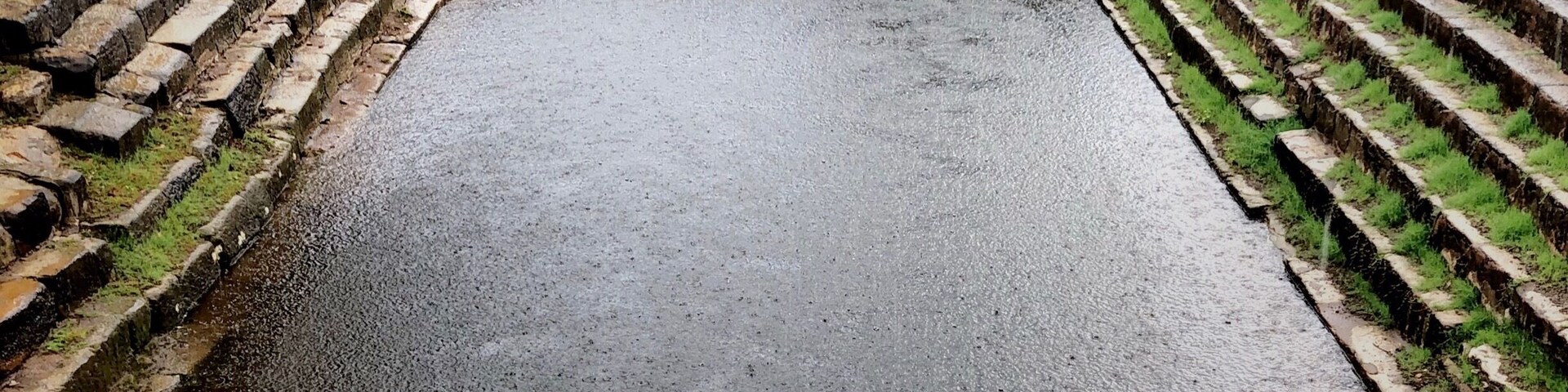 The ancient pool at Preah Vihear Temple. Back in the day it was used as a place to bathe before spiritual ceremonies and the water is still considered holy. You will see from time to time locals coming by to rinse their faces with this water for good luck. Or some would even bottled it for drinking.