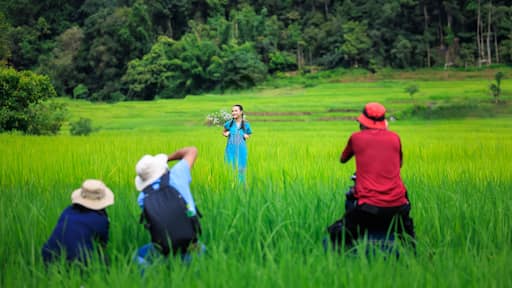Photographers taking pictures model at rice terrace Ban Pa Bon Piang, Chiang Mai Thailand,