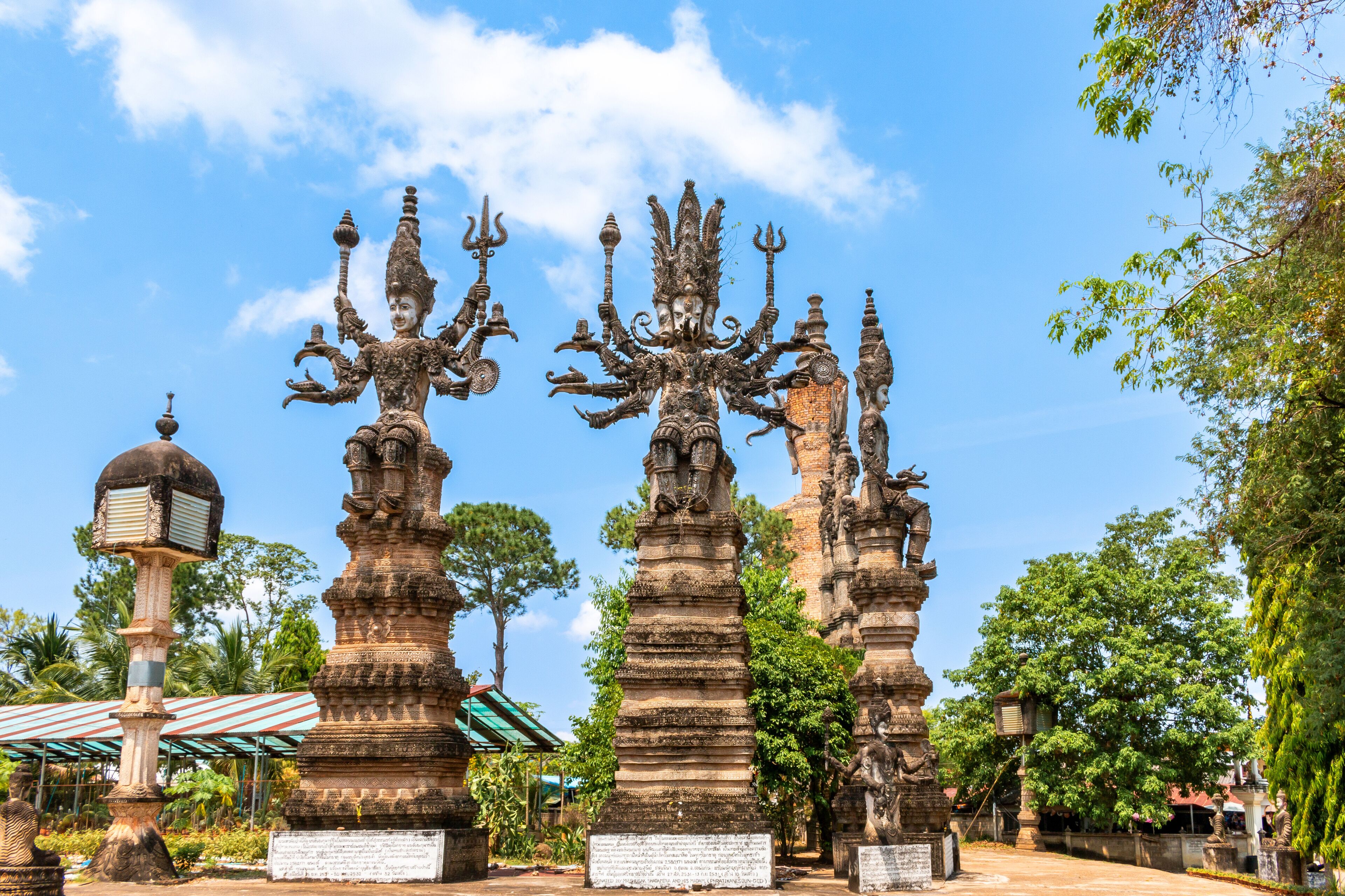 A temple with intricate carvings and multiple statues.