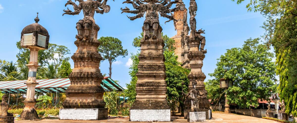 A temple with intricate carvings and multiple statues.