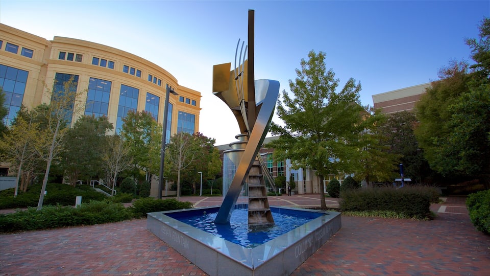 Downtown Columbia featuring outdoor art, a fountain and a garden